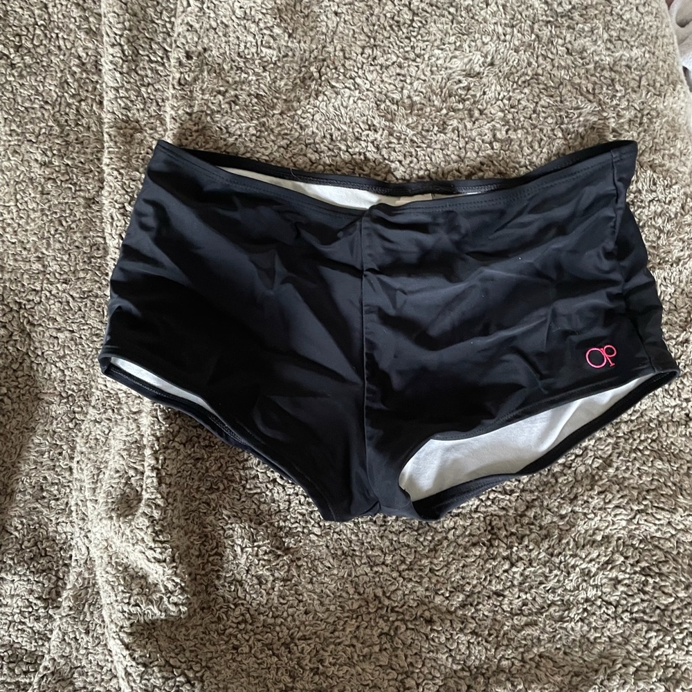 Two different swim shirt bottoms